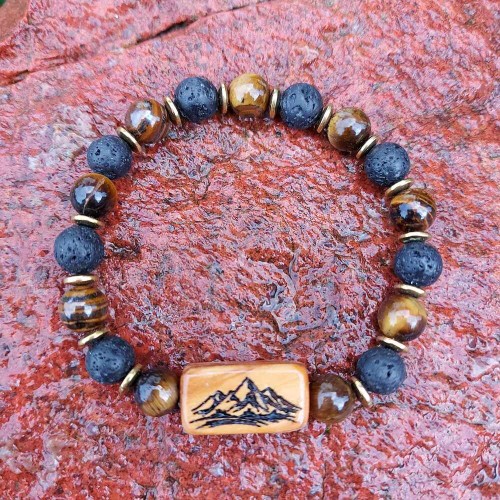 Bransoletka damska  tygrysie oko, lawa wulkaniczna, hematyt i drewno oliwne,  wzór wypalony na stałe,  góry, obwód bransoletki  16,5cm