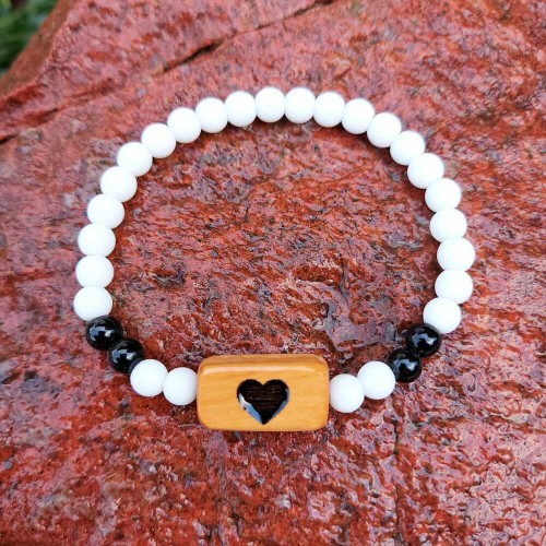 bransoletka damska  onyks, ceramika, drewno oliwne, wzór jest wypalony na stałe, obwód bransoletki 17cm