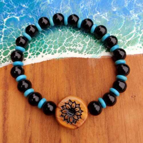 Bransoletka damska ręcznie robiona, onyks, howlit, drewno oliwne, wzór jest wypalony na stałe, obwód bransoletki 16,5cm