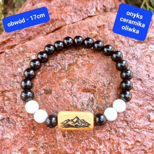 Bransoletka damska kamienie onyks ceramika i drewno oliwne z grawerem.  Obwód bransoletki: 17cm (po wewnętrznej stronie)