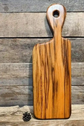 Ręcznie robiona drewniana deska do krojenia i podawania przekąsek z egzotycznego drewna orzecha boliwijskiego Nela Wood 63x21x3,5cm